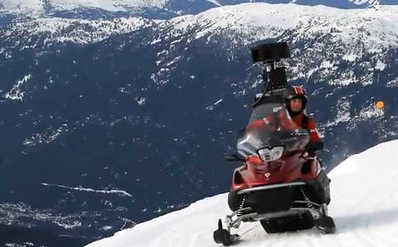 image of google street view capturing snow mobile on mountain slope skiing location